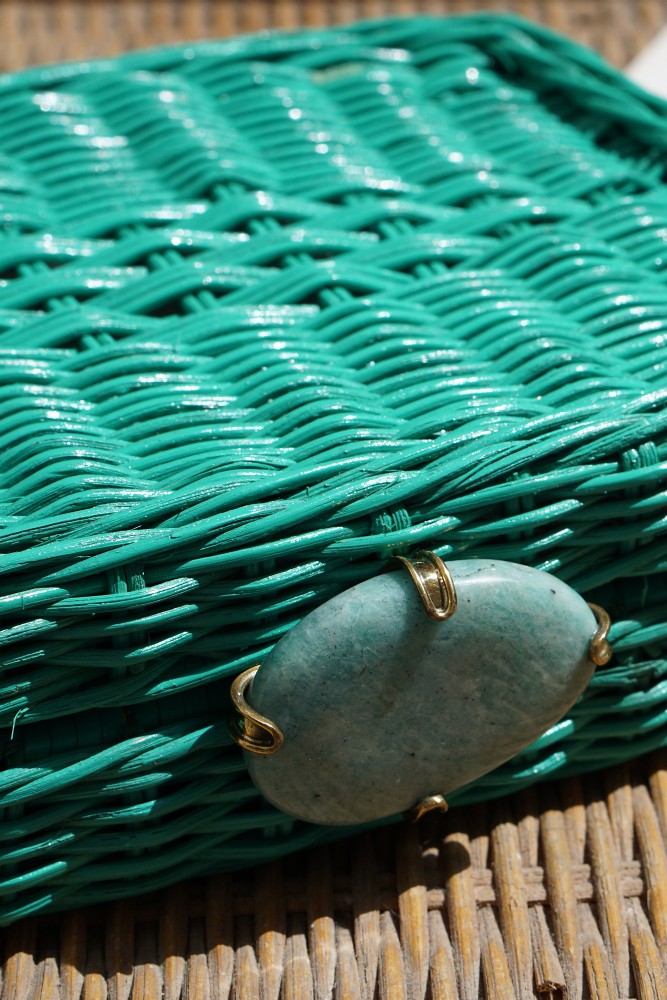 Hand-woven green minaudière in the traditional way in the Philippines.