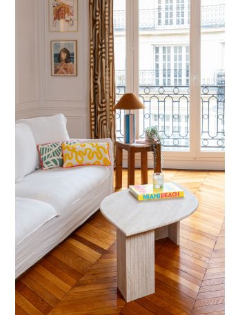 Handcrafted travertine petal-shaped coffee table designed in Morocco.