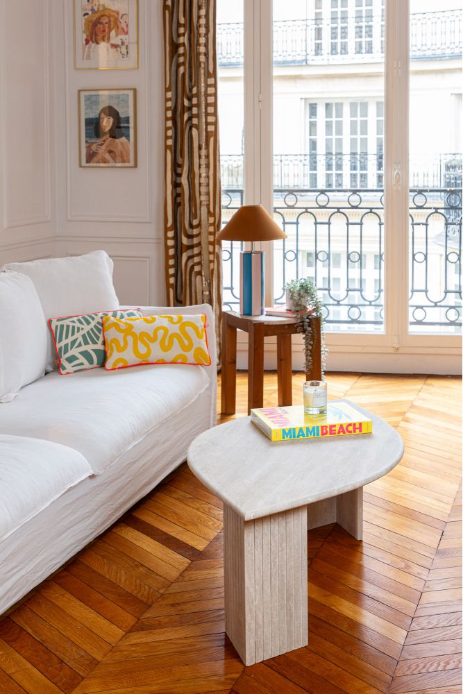 Handcrafted travertine petal-shaped coffee table designed in Morocco.